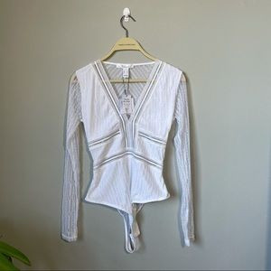 long sleeve body suit in white size small